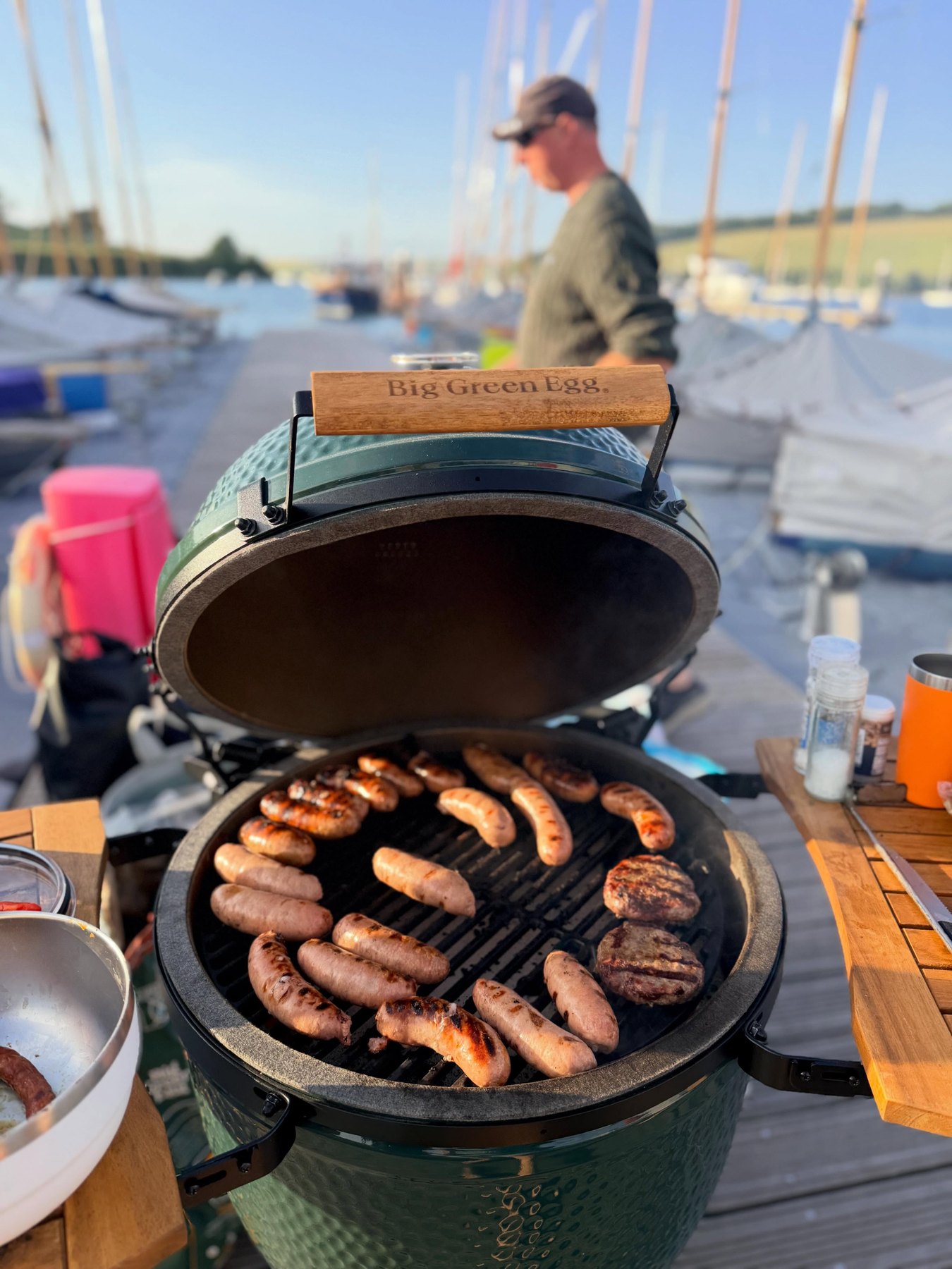 Sausages cooking beside the water in Salcombe