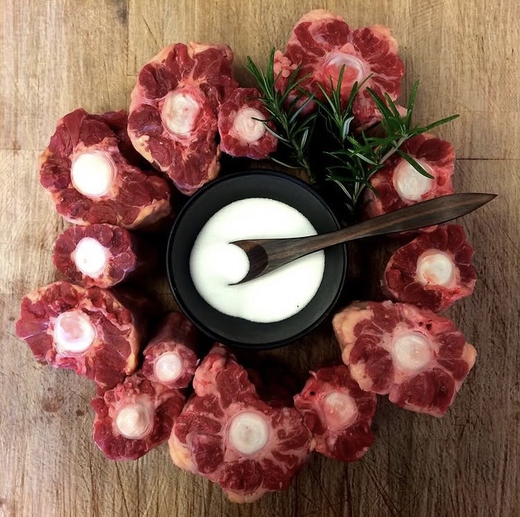 Prepared oxtail on a butcher block